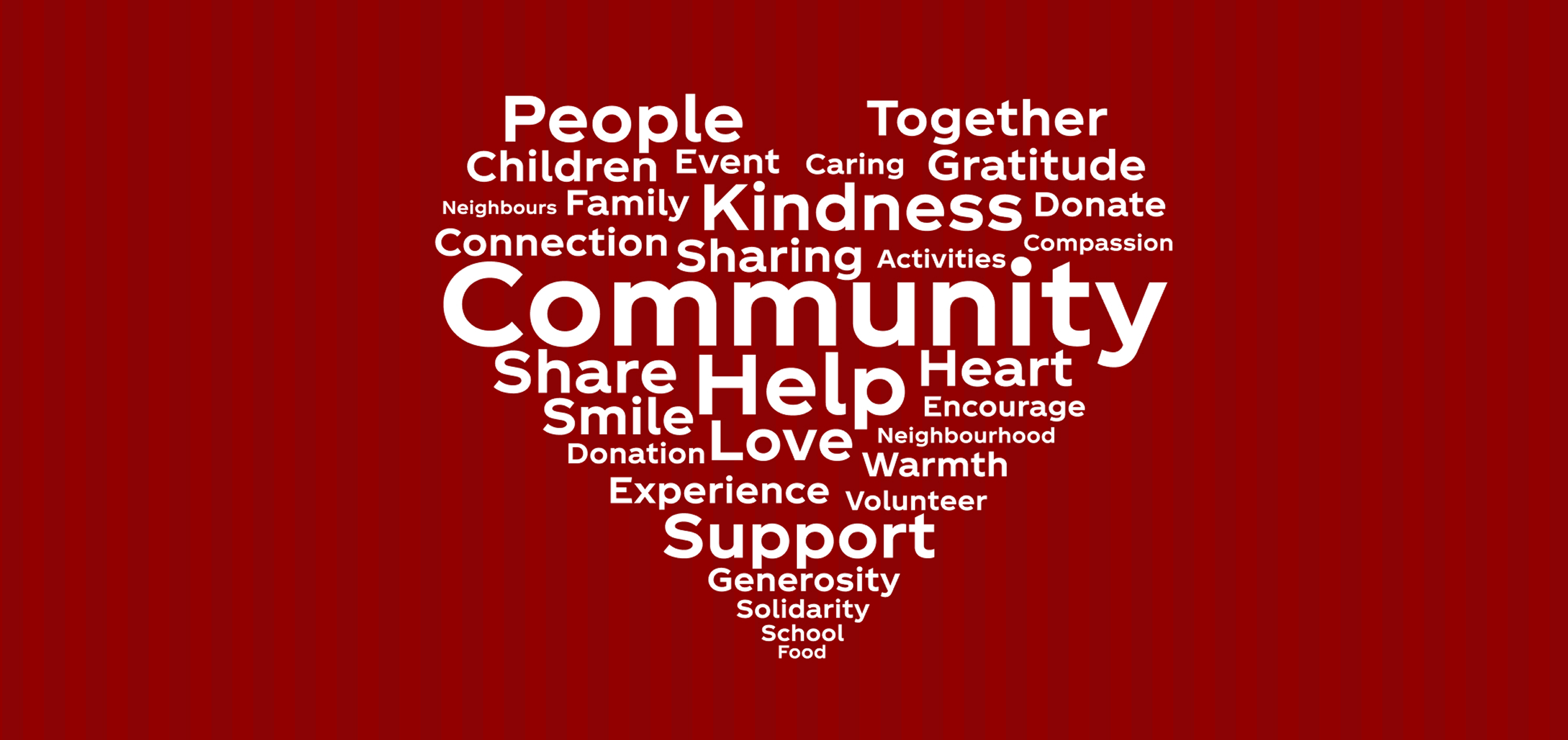 A white heart made up of kind words on a red background 