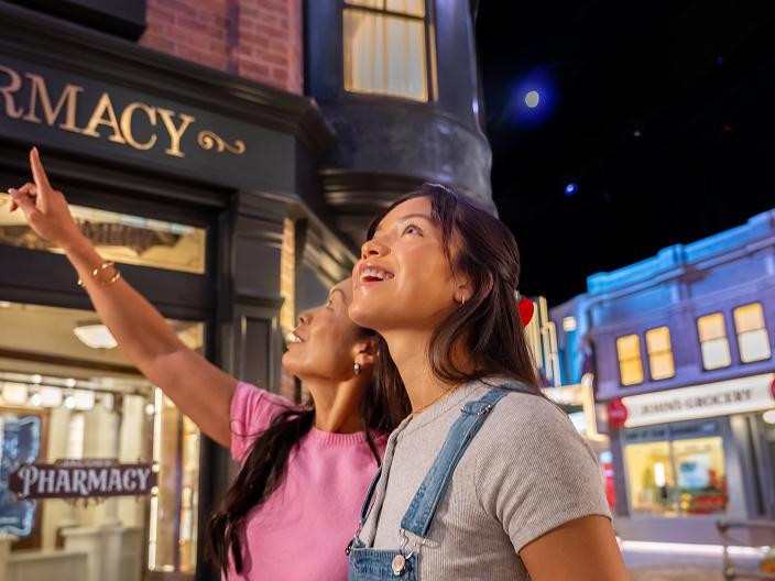people viewing images at world of coca-cola
