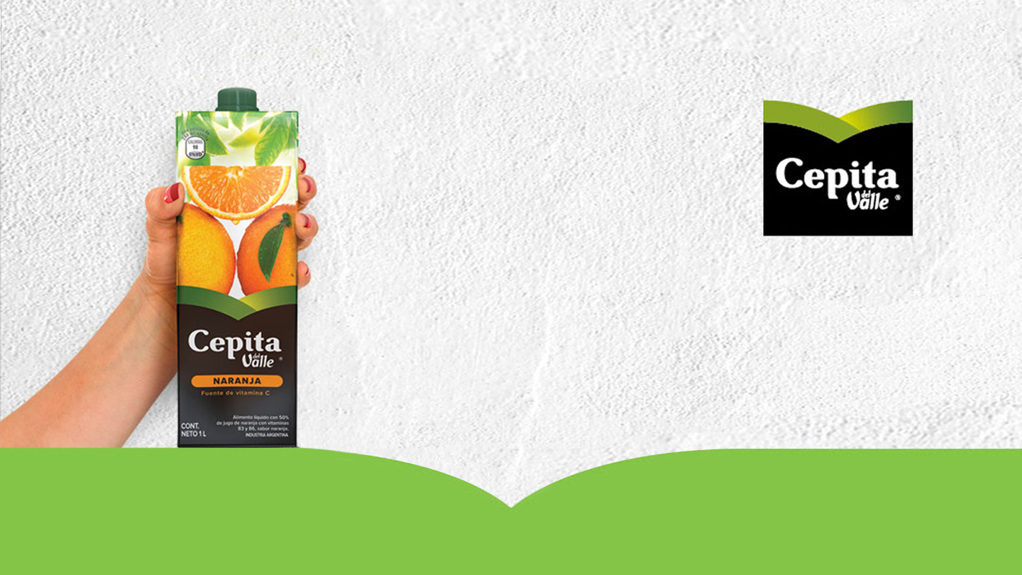 Mano sujetando Tetra Brik Cepita del Valle